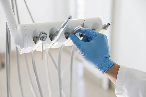 Professional Tooth Extraction technician working in Trenton, IL